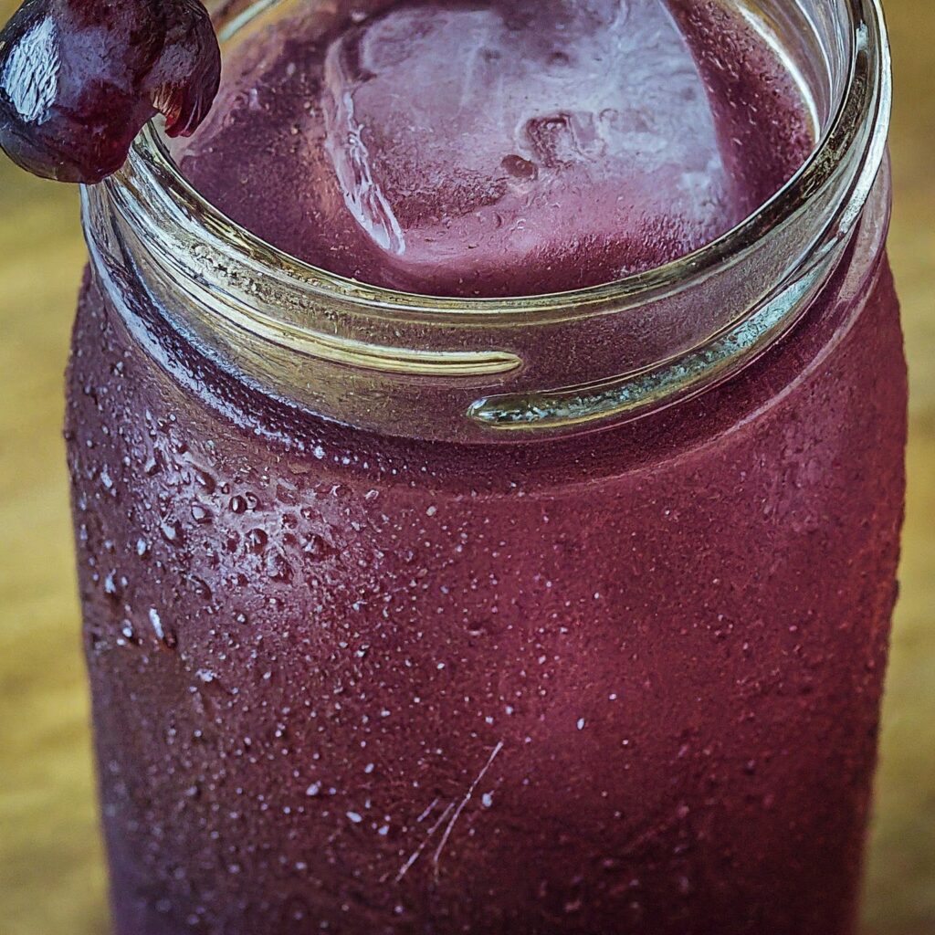 grape moonshine served in a jar