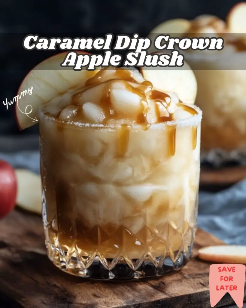 A tall glass filled with Caramel Dip Crown Apple Slush, the slushie is smooth and creamy with a rich caramel drizzle on top, garnished with a slice of green apple and set against a rustic wooden background with soft, warm lighting.